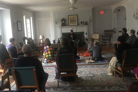 Picture of a closing talk at an insight meditation retreat taught by Peter Doobinin.